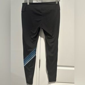 Aviator Nation black leggings with blue chevron  stripes. Size Large